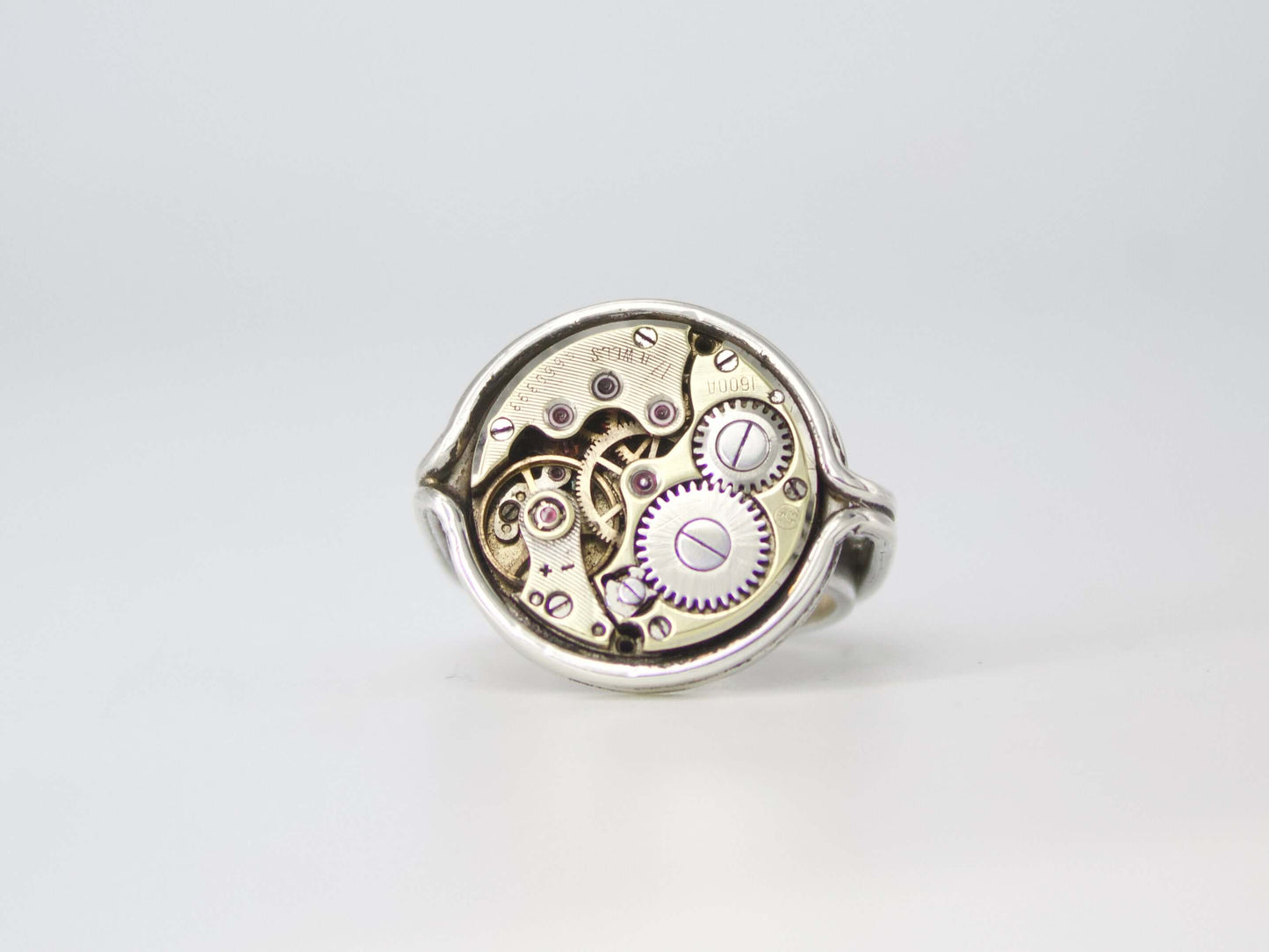 Anello Glimoire con meccanismo di orologio a vista in argento dal design unico