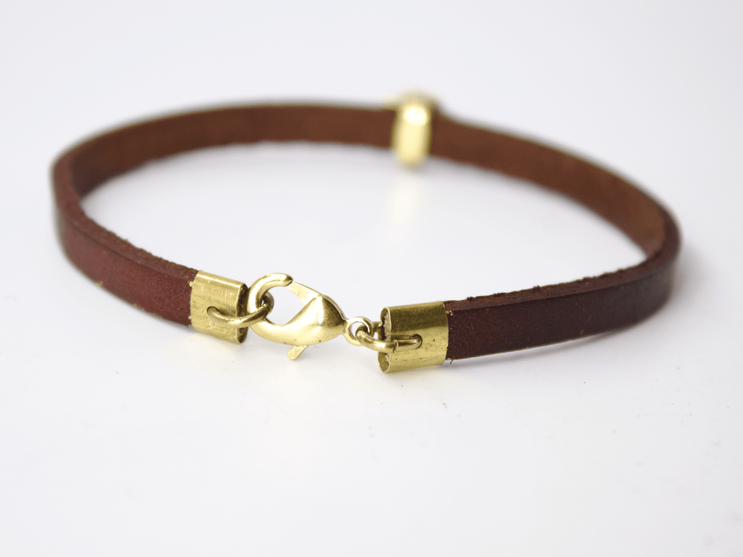 Glimoire bracciale uomo bronzo fatto a mano con cinturino in pelle marrone e chiusura a moschettone bronzo