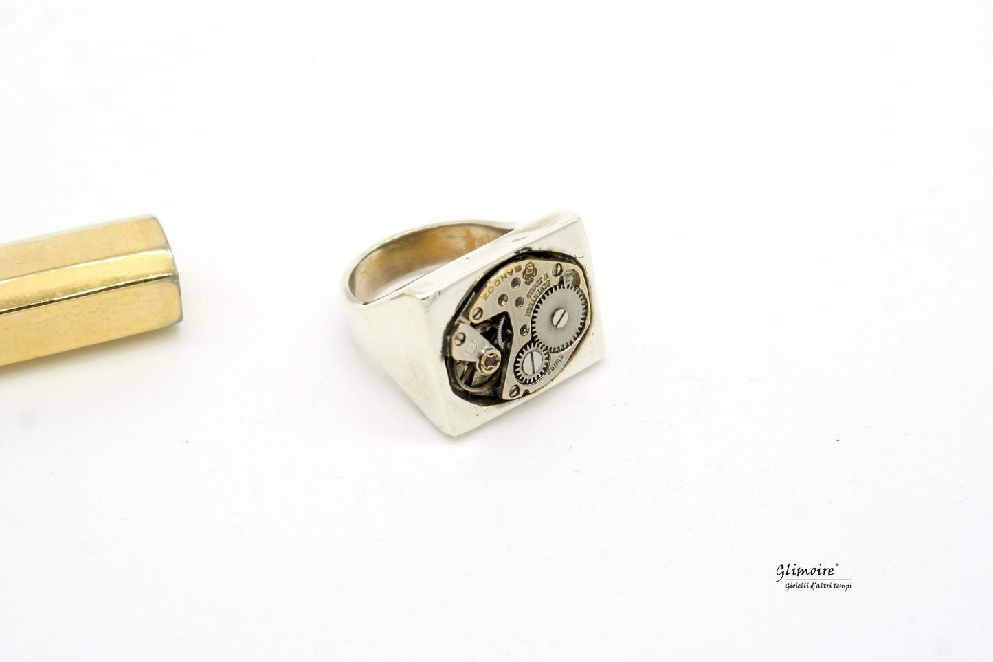 Anello in argento con meccanismo a ingranaggi di design unico firmato Glimoire