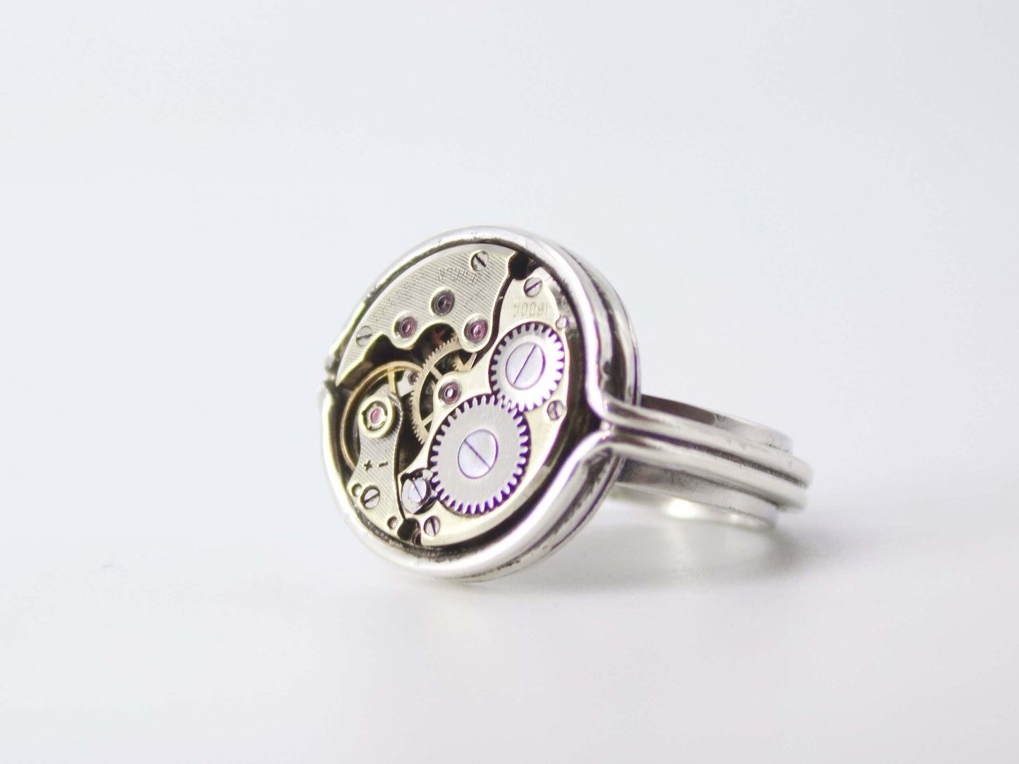 Anello tondo a doppio filo in argento con movimento meccanico di orologio anni 50