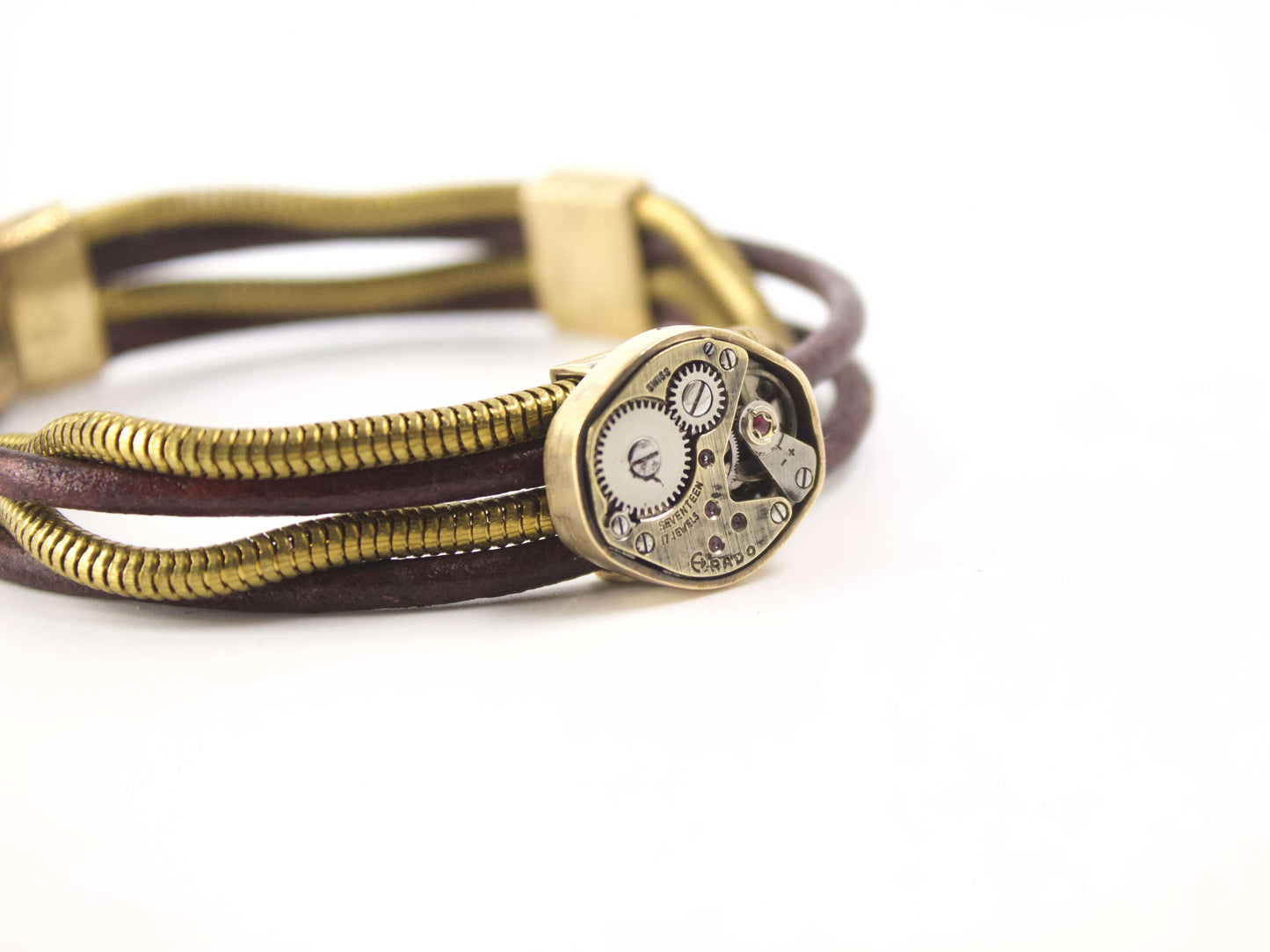 Bracciale artigianale meccanismo di orologio in cuoio e snake in ottone