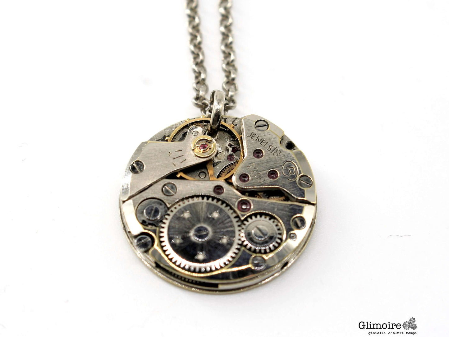 Collana con meccanismo orologio in metallo argento con dettagli intricati e design elegante