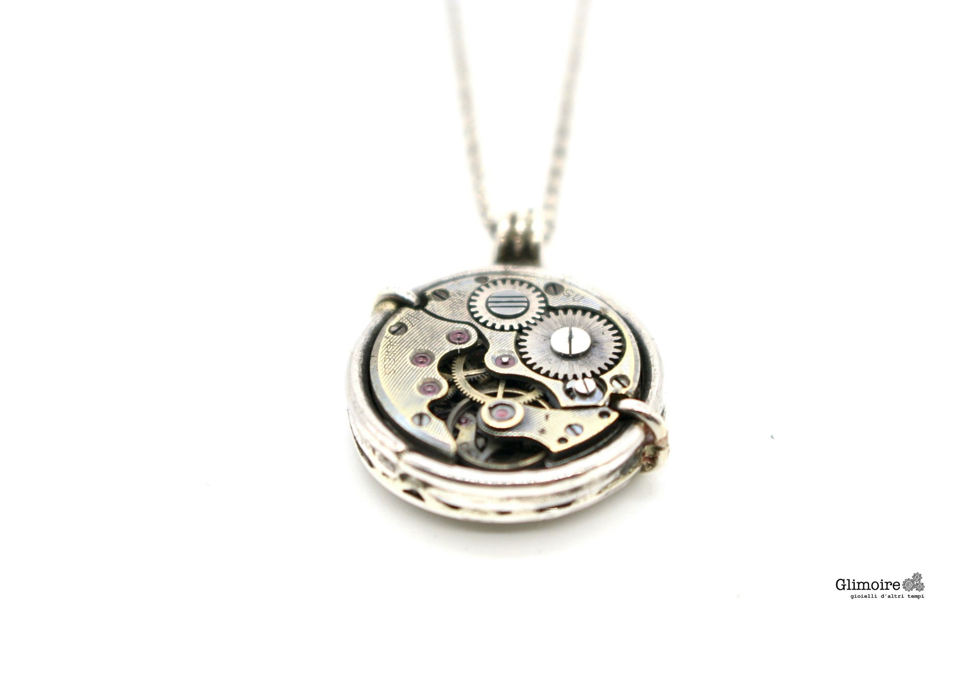 Collana in argento con meccanismo orologio visibile, con dettagli argento  e ciondolo rotondo. Ideale per amanti di gioielli unici.