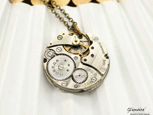 Collana unica Glimoire con meccanismo di orologio a carica manuale degli anni '50, dimensioni 70 cm.
