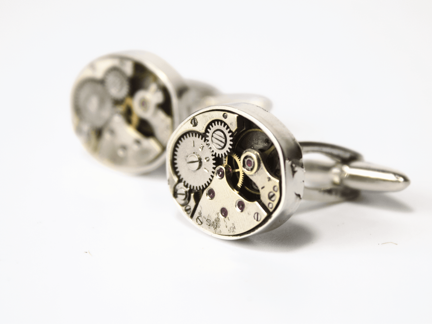 Gemelli da camicia Glimoire realizzati con meccanismi di orologi d'epoca