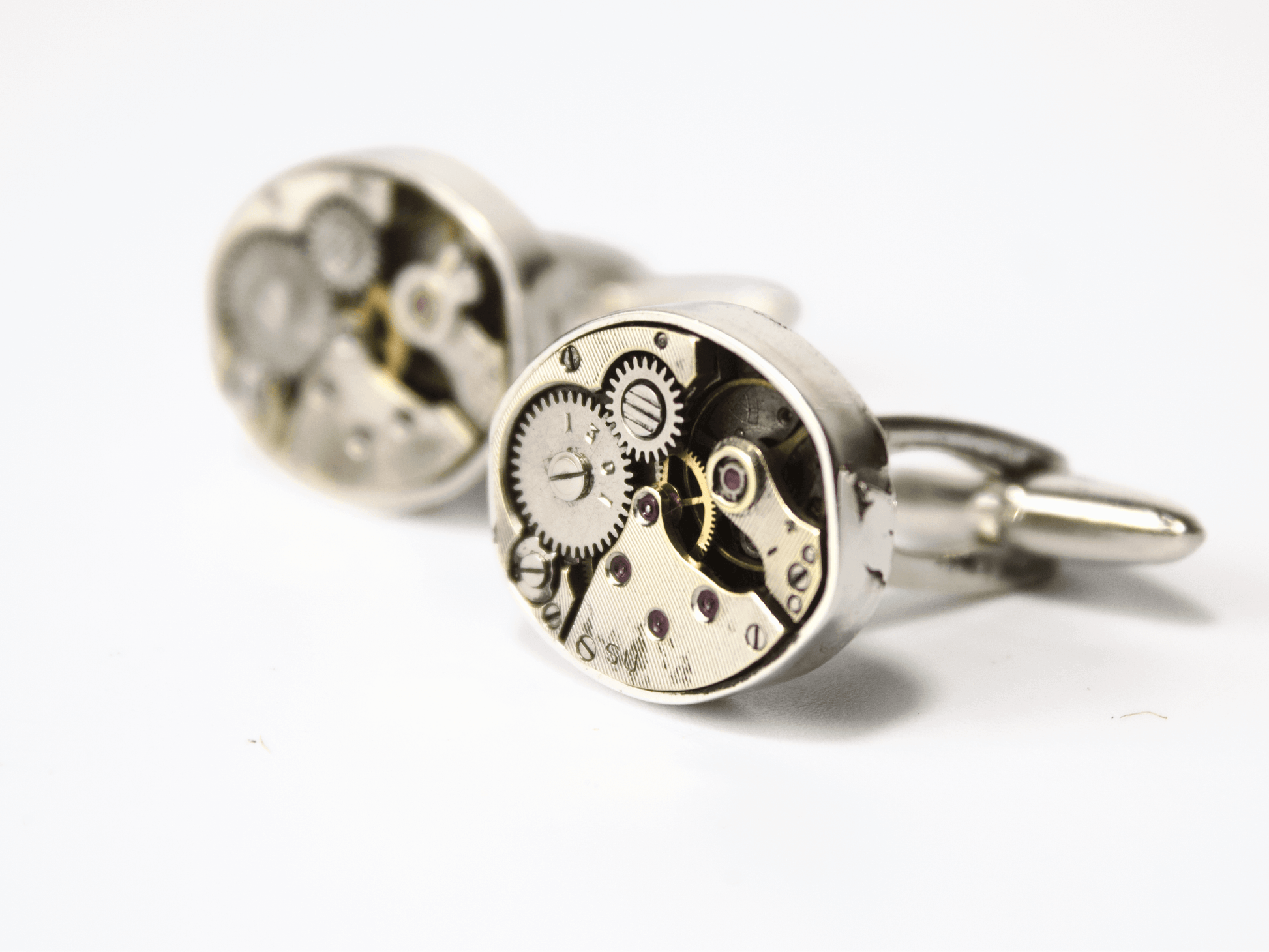 Gemelli da camicia Glimoire realizzati con meccanismi di orologi d'epoca