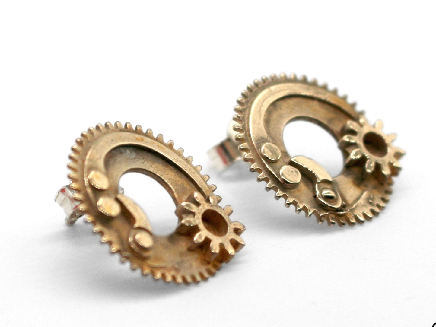 Orecchini ingranaggi in bronzo con design lavorato e particolari a forma di ingranaggio