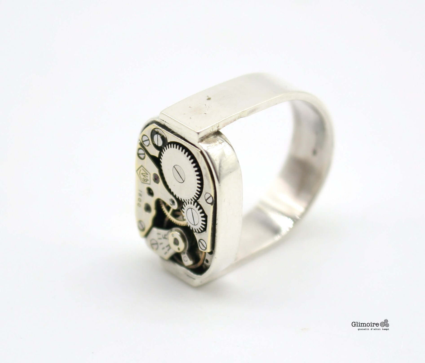 Anello con ingranaggi vintage in argento con dettagli meccanici a vista