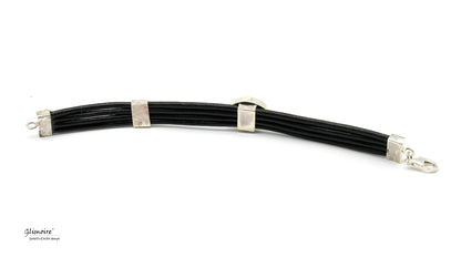Bracciale in cuoio nero con meccanismo di chiusura e dettagli metallici Glimoire elegante e moderno