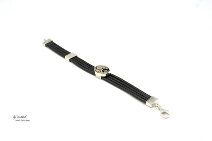Bracciale in cuoio nero con meccanismo Glimoire design elegante e chiusura in metallo argentato