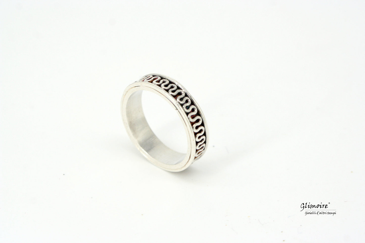Anello Glimoire con design a onde con Fede etrusca in argento dettagliata e lucida