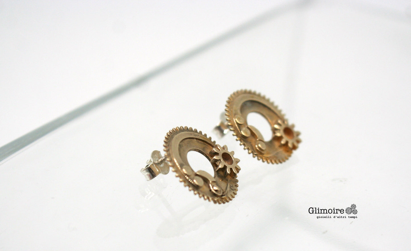Orecchini ingranaggi argento Glimoire a lobo stile steampunk in metallo brunito design dettagliato e leggero