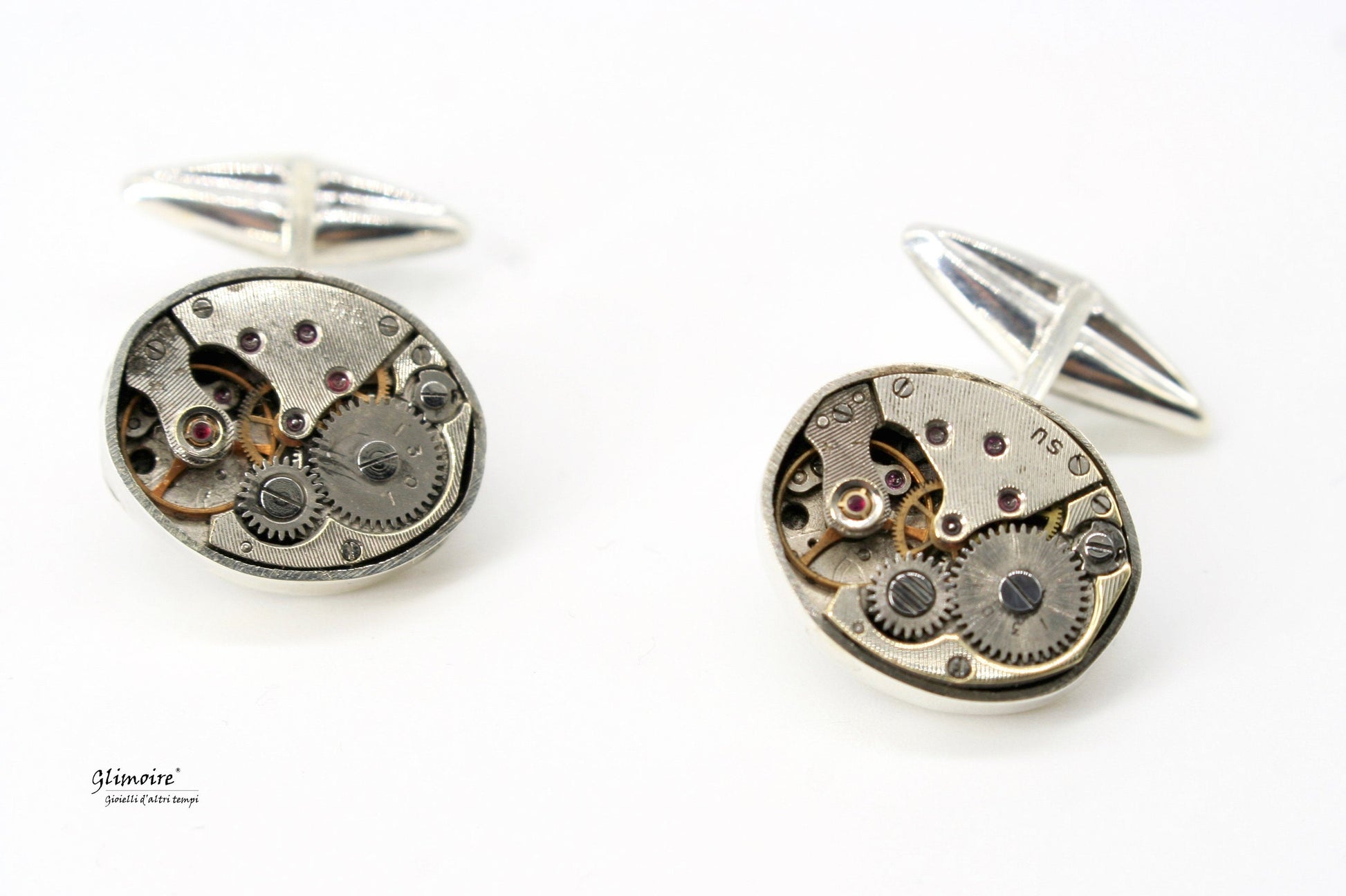 Gemelli con meccanismi di orologio d'epoca e rubini a vista. Gemelli ovali con movimenti vintage, In argento  con perno mobile art.276 - Glimoire